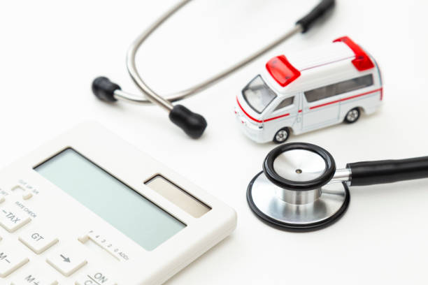 Ambulance, calculator and stethoscope.